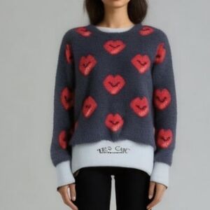 Wearing your heart on your sleeve sweater
